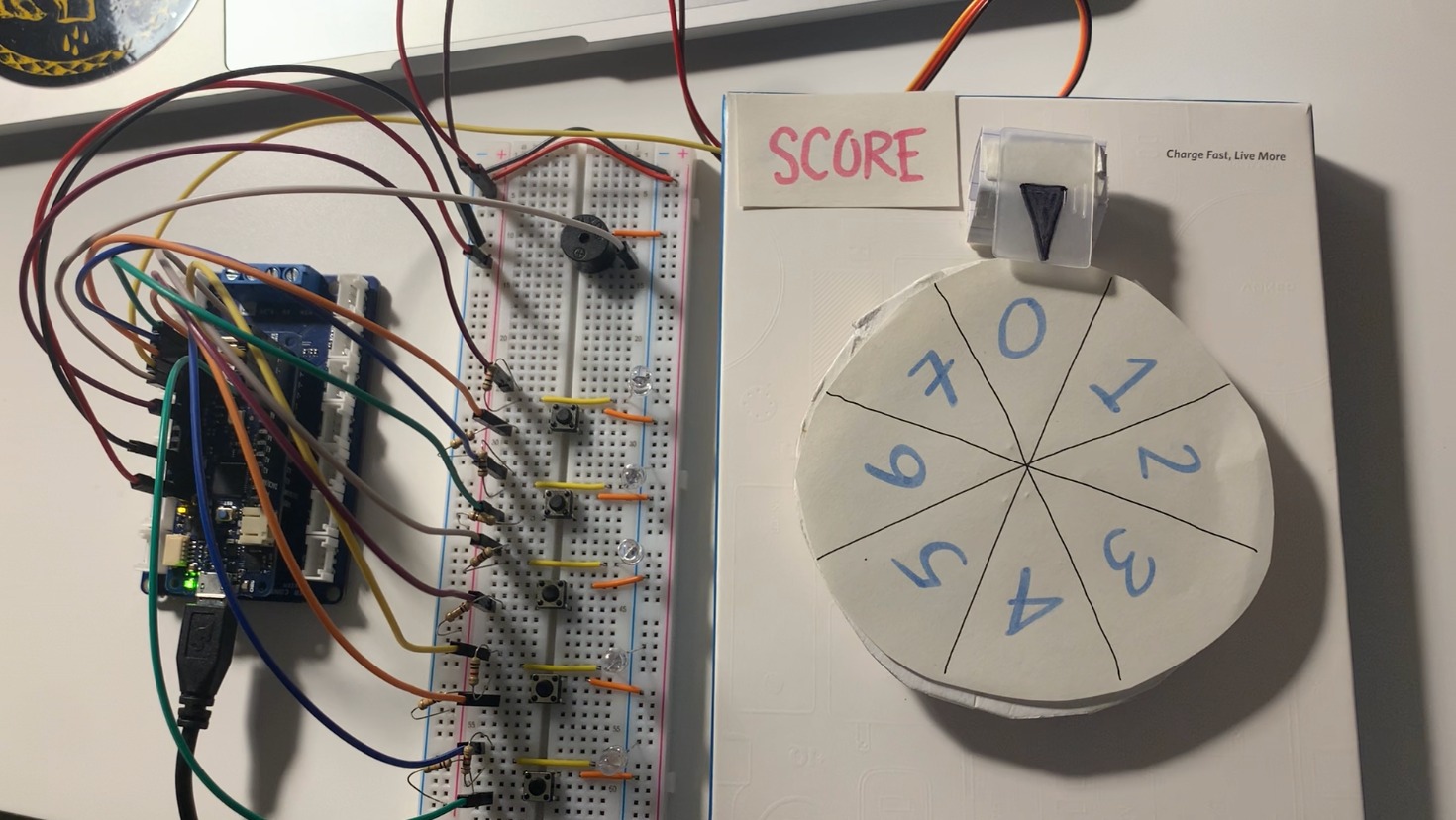 Game Setup with Arduino, Breadboard Circuit, and Servo Motor Score Wheel